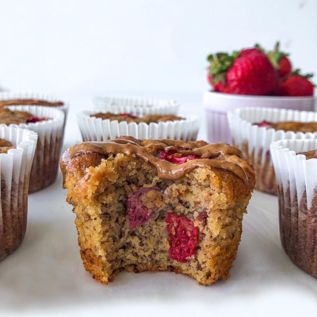 Healthy Strawberry Banana Muffins with almond butter topping